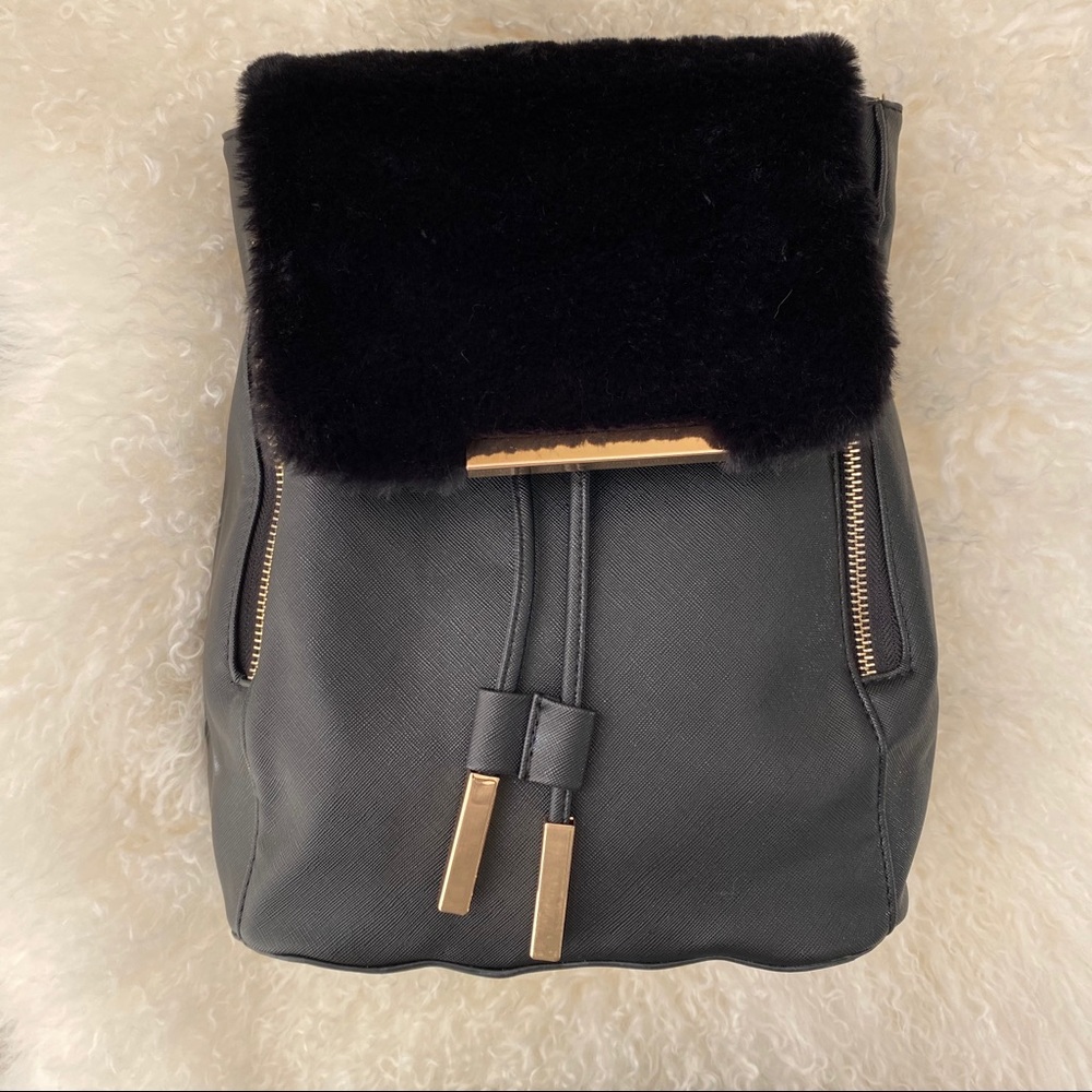 Black Faux leather and fur backpack